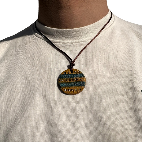 A Handmade Circular Necklace with Sumerian Inscriptions and Decorations
